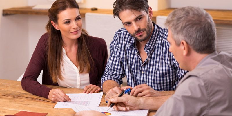 Couple meeting financial advisor