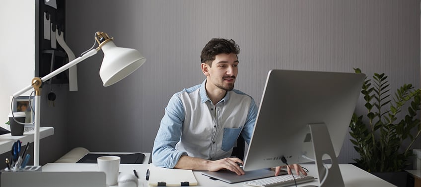 A designer laying out the rough sketch of a realtor website