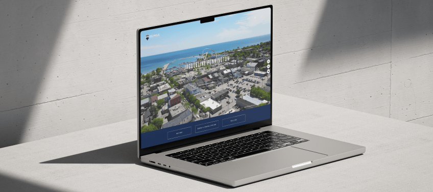 A laptop showcasing Jacqueline Pennington’s real estate website.