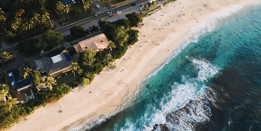 An aerial view of a high-end coastal neighborhood.
